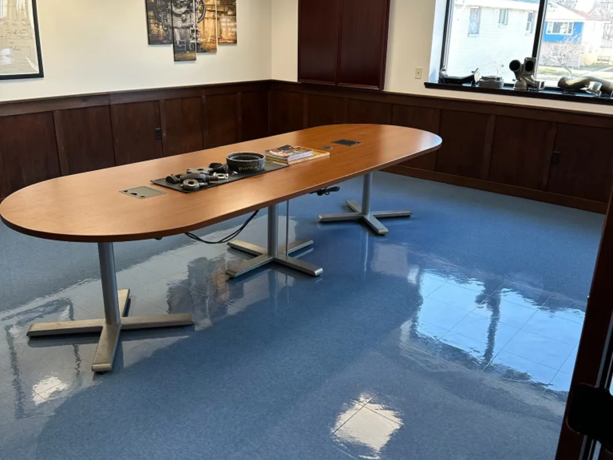 Polished blue VCT floor in a conference room