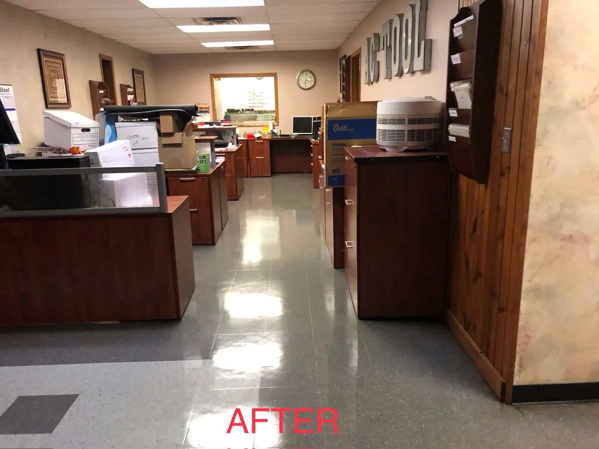 Buffed VCT floor in an open office work area