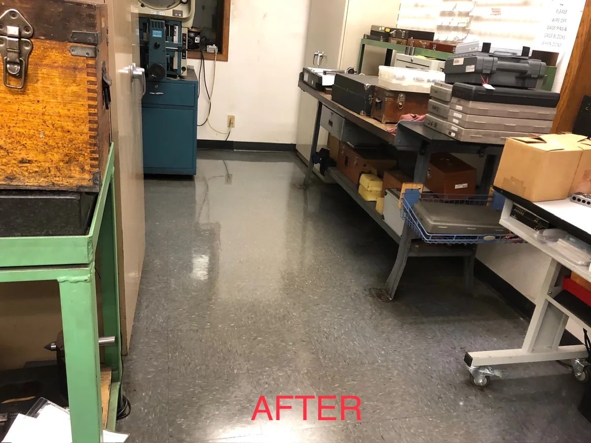 High gloss VCT floor between machine shop benches